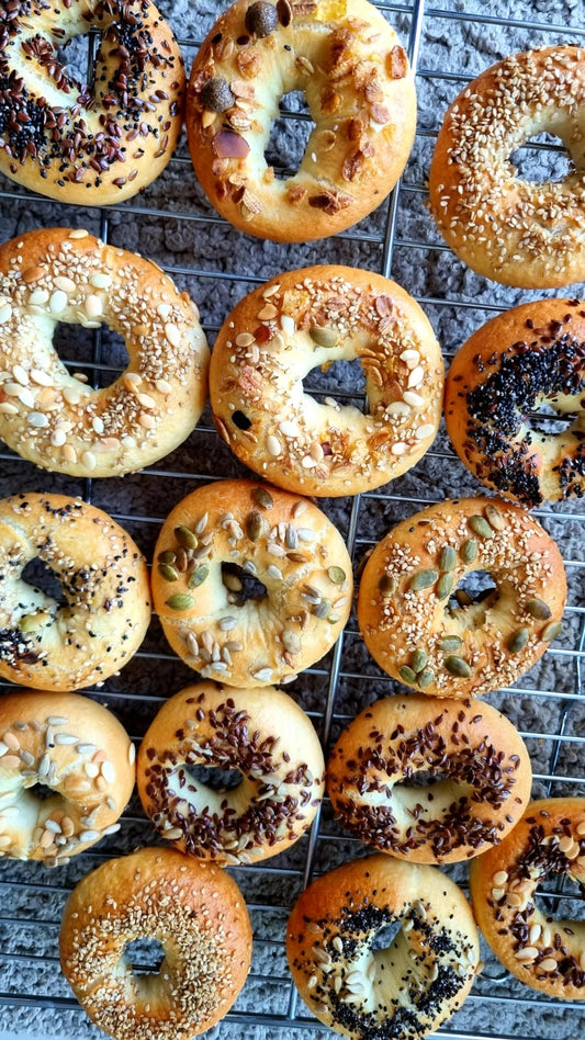 Fresh bagels with various seeds